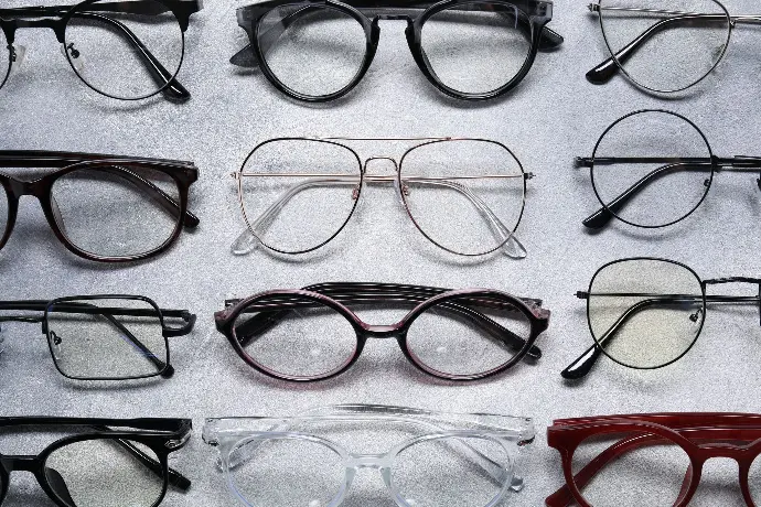 Glasses-GuyHoldingGlasses-Optical-Dispensing